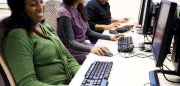 Image of teachers working at computers